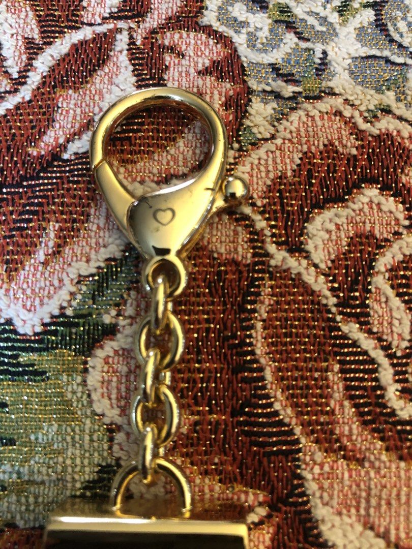 💯 Lovcat Paris Tassel (Category: Luxury Accessories) located in Lapu Lapu. Submitted by maro8 (Listing ID 1460183841, Image 3). Description: - Cream leather tassel keychain / bag charm from the French-inspired fashion brand Lovcat Paris. - Gold-tone hardware clasp and a scalloped metallic cap engraved with the brand’s logo..