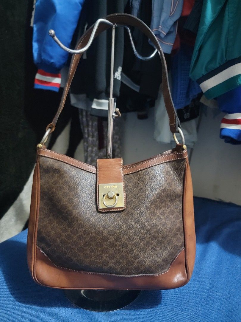 ✨ CELINE Vintage Macadam Shoulder Bag 🤎 (Category: Shoulder Bags) located in Cavite. Submitted by kaik_lux (Listing ID 1460136549, Image 1). Description: Vintage CELINE • Macadam monogram canvas • Brown leather trim • Gold-tone hardware • Spacious shoulder bag • Pre-loved condition — please see photos for actual condition 📍 Location: Silang, Cavite 🚚 Shipping available via J&T / Flash / Lalamove.
