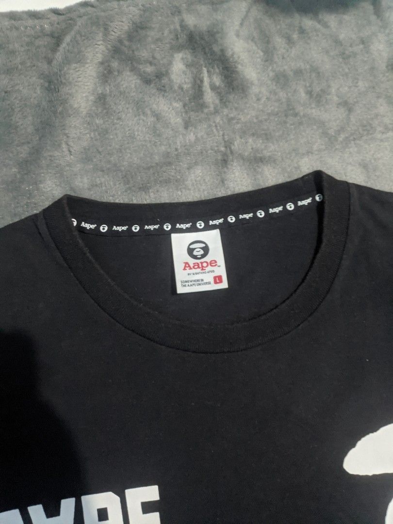AAPE BY A BATHING APE (Category: Tshirts & Polo Shirts ) located in San Ildefonso. Submitted by tripniberto (Listing ID 1460161981, Image 2). Description: AAPE Dimes: 21.5/28.5L Issue: Need wash, Cut washtag, sign of use( color) Color Rate: 8.8/10(or better) (lighting may affect the color on images) MOP: gcash MOD: j&t(+sf) NO RUSH SHIPPING!!! (3-5days Ship out!) please manage your expectations this is ukay items PM if interested 📩 Bulacan 📍.