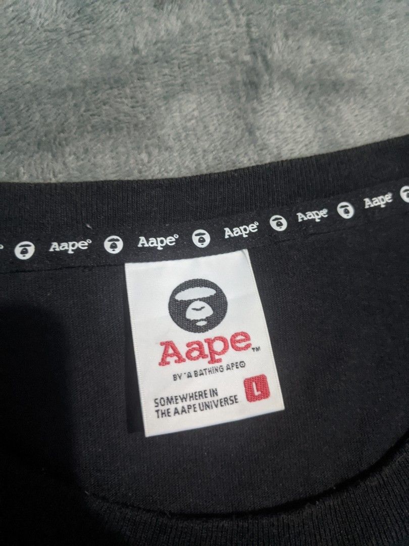 AAPE BY A BATHING APE (Category: Tshirts & Polo Shirts ) located in San Ildefonso. Submitted by tripniberto (Listing ID 1460161981, Image 3). Description: AAPE Dimes: 21.5/28.5L Issue: Need wash, Cut washtag, sign of use( color) Color Rate: 8.8/10(or better) (lighting may affect the color on images) MOP: gcash MOD: j&t(+sf) NO RUSH SHIPPING!!! (3-5days Ship out!) please manage your expectations this is ukay items PM if interested 📩 Bulacan 📍.