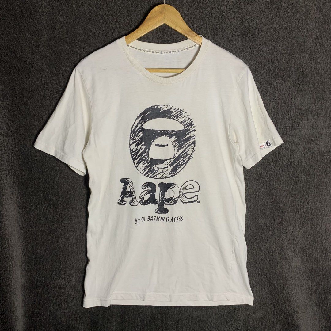 aape white shirt (Category: Tshirts & Polo Shirts ) located in Arayat. Submitted by capymelon (Listing ID 1460270152, Image 1). Description: cut tags off/legit with signs of use dm for dimes!.