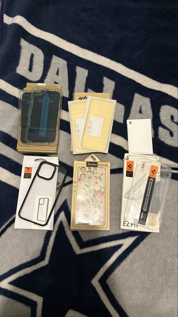 Accessories for iPhone 15 ProMax (Category: Other Mobile & Gadget Accessories) located in Dagupan City. Submitted by jagaray_ (Listing ID 1460286260, Image 2). Description: Accessories for iPhone 15 ProMax •2pcs Spigen Privacy Tempered glass •2pcs 9D Clear Tempered glass •Spigen tempered glass installer •Spigen Case (used once) •Flower Case (Never used) all in good condition price is firm.