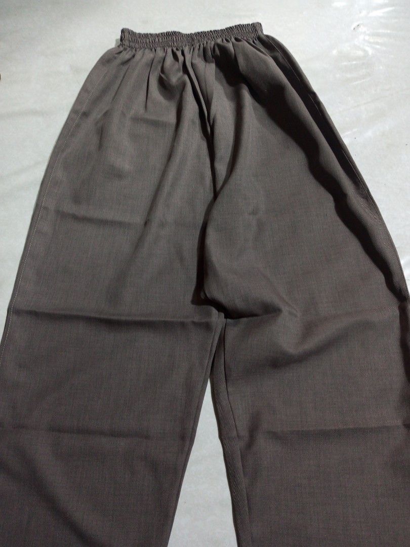 ACTEC Scrub Top and Pants Set (Category: Activewear) located in Malolos. Submitted by radapostol (Listing ID 1460163198, Image 2). Description: - Brown scrub top and pants set. - Top features a V-neck and a chest pocket with ACTEC logo. - Pants have a comfortable elastic waistband. - Ideal for medical professionals..