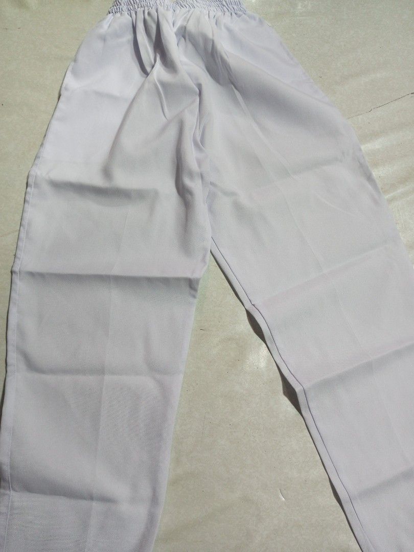 ACTEC White Scrub Suit Top and Pants (Category: Sets or Coordinates) located in Malolos. Submitted by radapostol (Listing ID 1460162088, Image 2). Description: - White scrub suit set (top and pants) - Top features stylish brown trim and side buttons - Pants have a comfortable elastic waistband - Ideal for medical and nursing students.