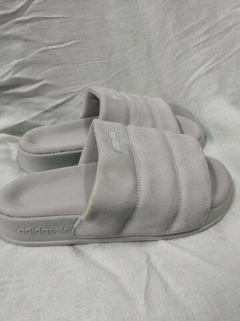 Adidas Adilette Comfort Slides Grey (Category: Slippers & Slides) located in Pasay City. Submitted by emelsthrift1997 (Listing ID 1460120650, Image 3). Description: - Grey Adidas Adilette Comfort slides - Padded strap for enhanced comfort - Easy slip-on design - Ideal for casual outings or post-activity wear - Size: 6 UK / 38 EU -used.