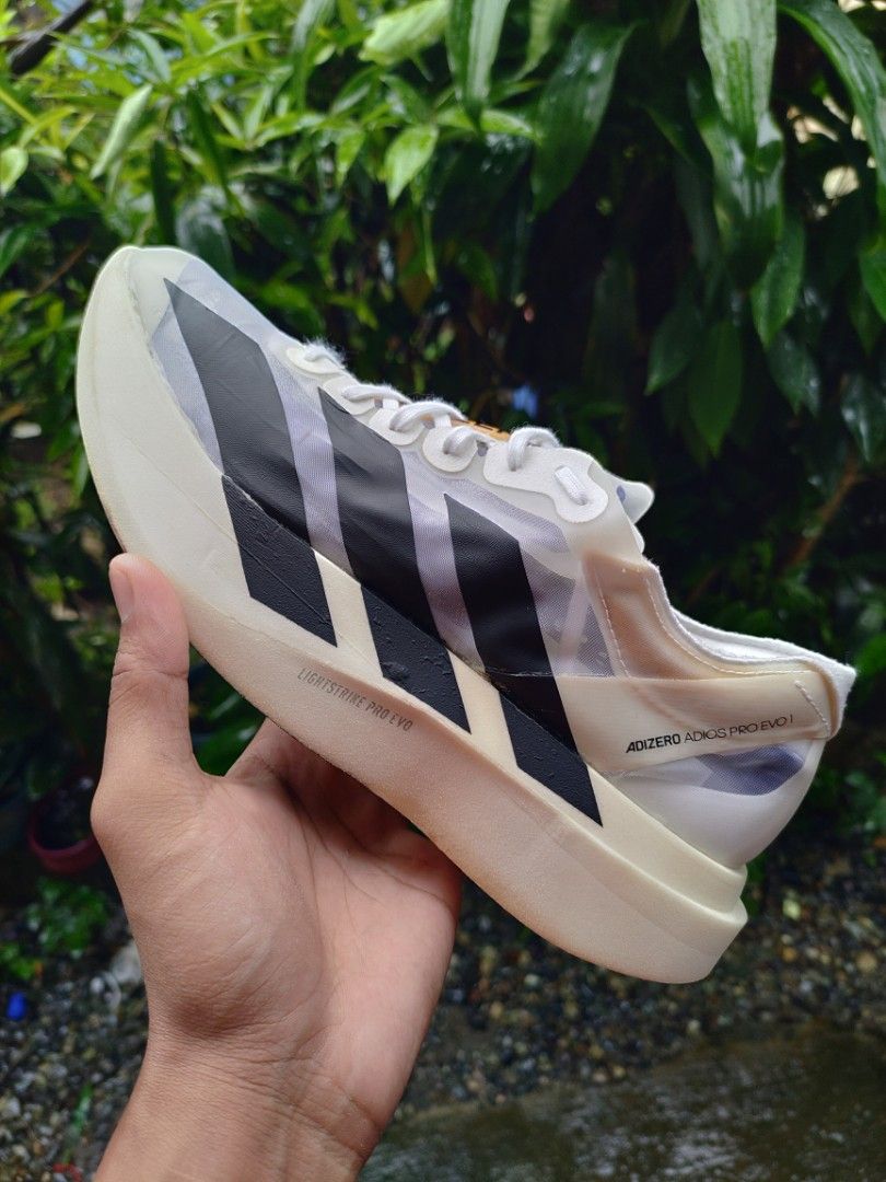 Adidas Adizero Adios Pro Evo 1 (Category: Sneakers) located in Malasiqui. Submitted by shoesyourbrand (Listing ID 1460118752, Image 2). Description: 𝗮𝗱𝗶𝗱𝗮𝘀 𝗔𝗱𝗶𝘇𝗲𝗿𝗼 𝗔𝗱𝗶𝗼𝘀 𝗣𝗿𝗼 𝗘𝘃𝗼 𝟭(AUTHENTIC/ORIGINAL) SIZE: US 8 MENS | EUR 41⅓ | 26CM GOOD CONDITION | REPAINTED LOGO/REGLUE PRICE: ₱𝟯,𝟮𝟵𝟵 FREE SHIPPING 🚛 📌NOTE: BAWAL SA MASELAN😇 PAYMENT FIRST BASIS MODE OF PAYMENT: GCASH, BANK TRANSFER COURIER SERVICE: J&T EXPRESS | DO