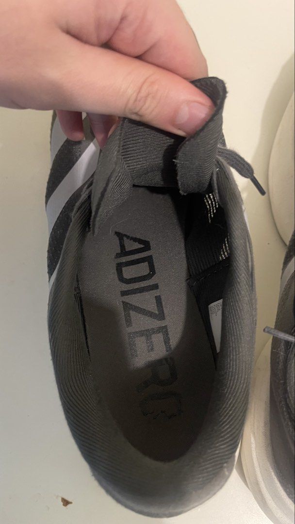 Adidas Adizero Pro Running Shoes (Category: Sneakers) located in Manila. Submitted by everythingmustgopage (Listing ID 1460164313, Image 2). Description: - Adidas Adizero Pro running shoes - Color: Dark grey with light grey stripes - Cushioning: Lightstrike Pro - Size: US 11 / UK 10.5 / EU 45 - Origin: Made in Vietnam - Ideal for running.