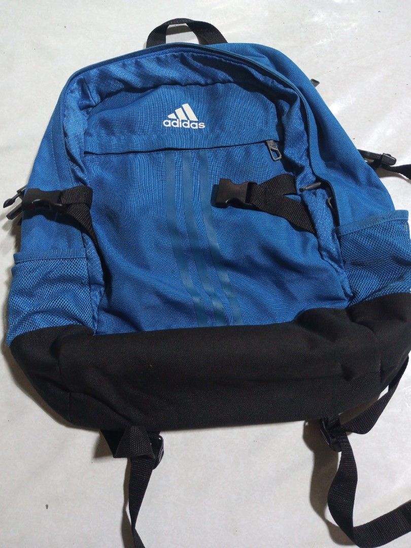 Adidas Blue Backpack (Category: Backpacks) located in Malolos. Submitted by radapostol (Listing ID 1460163991, Image 1). Description: - Blue Adidas backpack with black accents - Classic Adidas stripes on the front - Two side pockets for extra storage - Adjustable straps for a comfortable fit - Zipped main compartment for secure storage - Ideal for school or everyday use.