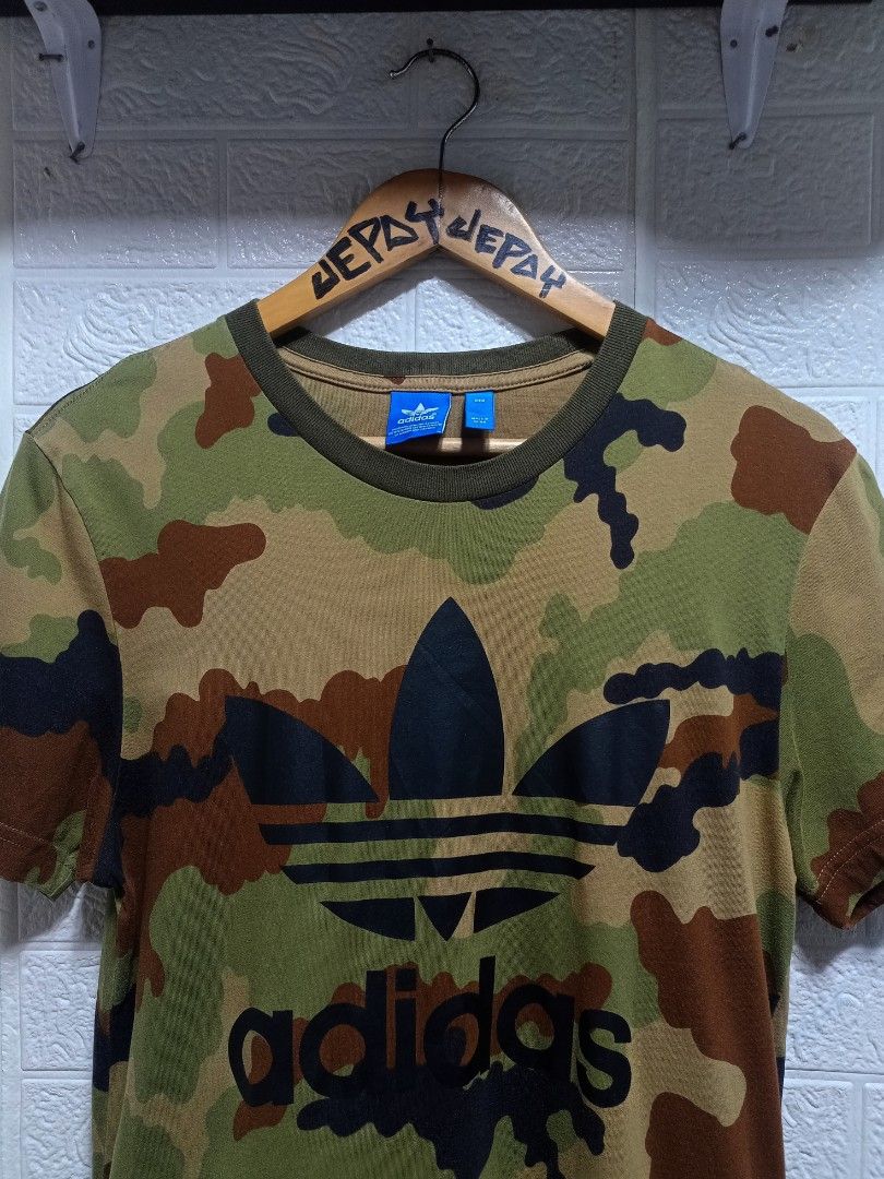 Adidas Camou (Category: Tshirts & Polo Shirts ) located in Danao, Cebu. Submitted by 6000thrifts.ph (Listing ID 1460252826, Image 2). Description: Adidas Camouflage 💥 Size Small to Med 27L/ 20W Good Excellent Condition Color rate 9.5/10 No issue Pm for the price 📥.