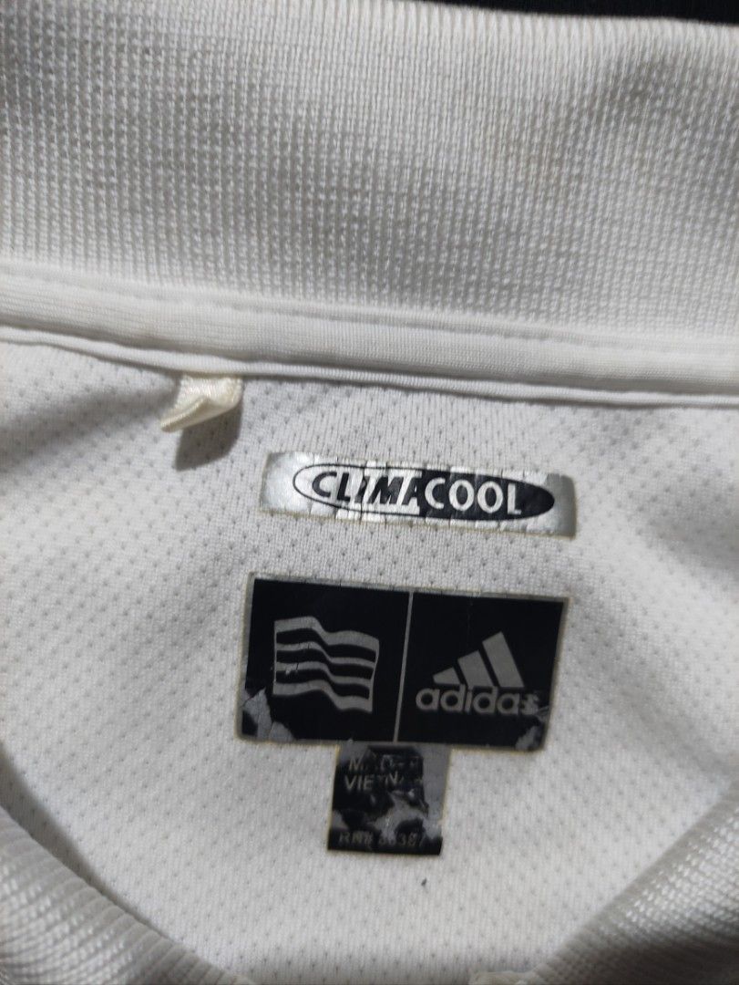 Adidas ClimaCool Striped Golf Polo Shirt (Category: Tshirts & Polo Shirts ) located in Binan City. Submitted by mmrl_rmwl00 (Listing ID 1460244135, Image 3). Description: - Adidas ClimaCool Golf Polo Shirt -24x31.5 - Stylish horizontal stripes (white, blue, brown) - Breathable 100% polyester fabric - Short sleeves with classic collar and button placket - Perfect for golf, sports, or everyday casual wear - Made in Vietnam.
