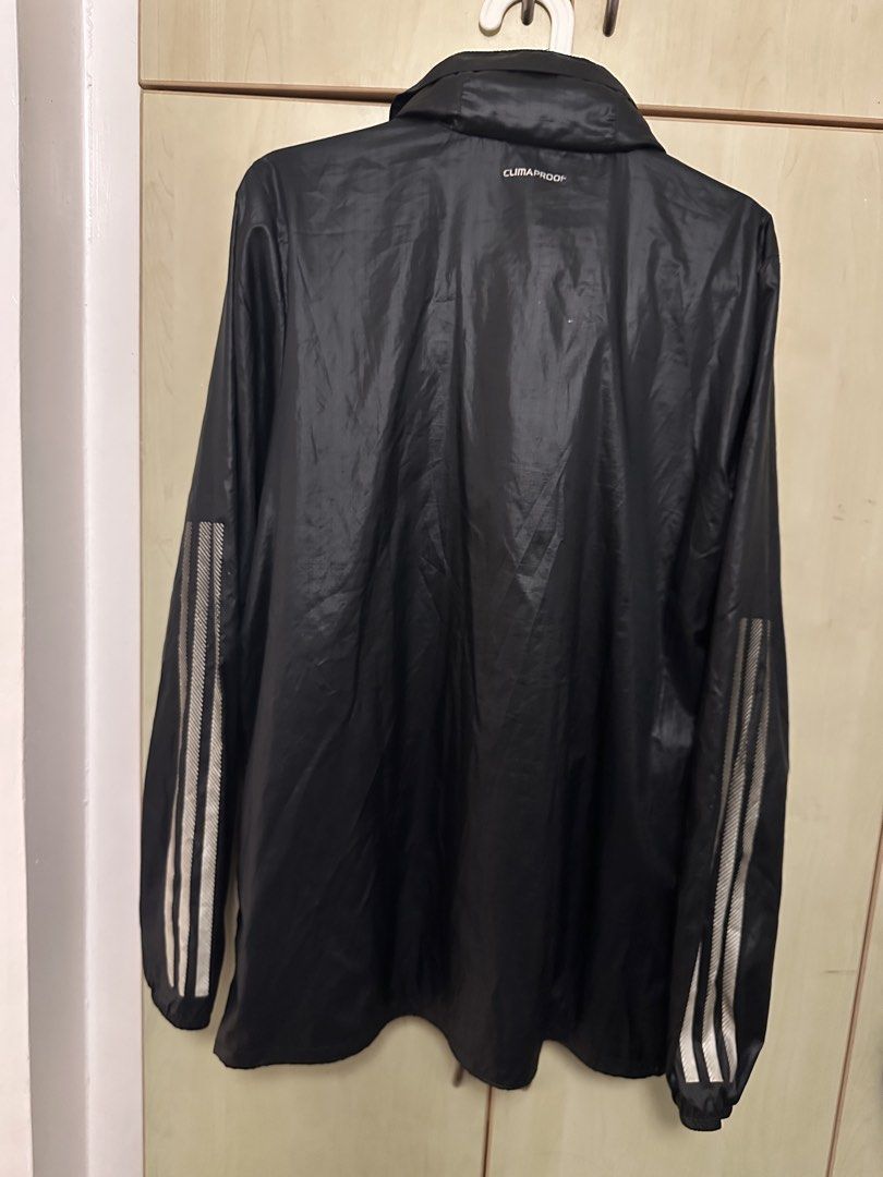 Adidas Climaproof windbreaker jacket L (Category: Coats, Jackets and Outerwear) located in Quezon City. Submitted by mancave_stuff (Listing ID 1460209372, Image 2). Description: Adidas Climaproof Windbreaker hoodie jacket Concealable hoodies Black with silver 3 stripes and red center lining For workout, running, or any sports and outdoor lifestyle. Lightweight & waterproof.