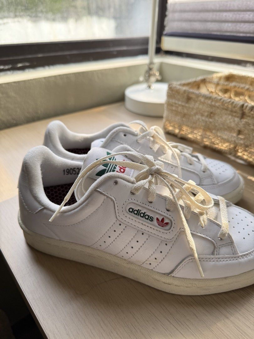 Adidas Continental 80 White Sneakers (Category: Sneakers) located in Manila. Submitted by itgirlph (Listing ID 1460222542, Image 2). Description: - Classic white Adidas Continental 80 sneakers - Size: 6.5 UK - Condition: Minor scuffs on toe box and soles from normal wear - Plenty of life left, great for everyday wear.