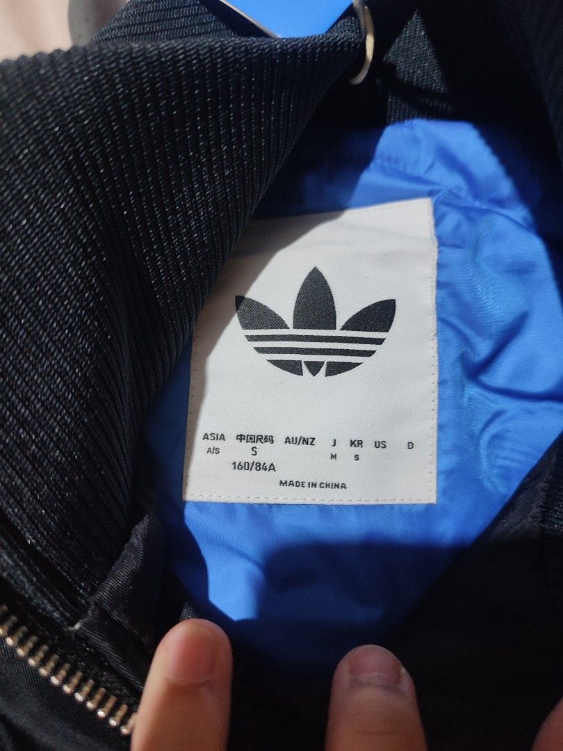 Adidas Firebird Jacket Black (Category: Coats, Jackets and Outerwear) located in Antipolo. Submitted by lanetatum (Listing ID 1460256376, Image 3). Description: - Adidas Firebird Jacket - Color: Black - Size: S (Asia fit) - Original Price: PHP 7,500 - Made in China - Ideal for casual wear.