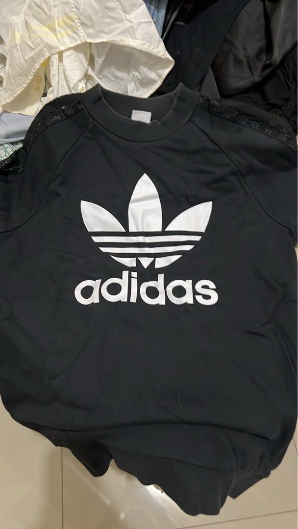 Adidas sweater with lace sleeves (Category: Others Tops) located in Manila. Submitted by chrissysavant130 (Listing ID 1460130395, Image 1). Description: Black Adidas Sweater, lace see through sleeves details .