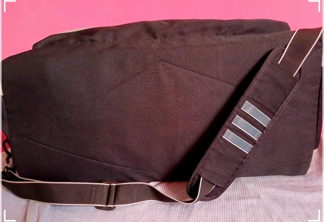 Adidas travel Bag take all (Category: Sling Bags) located in Antipolo. Submitted by cassidy1900 (Listing ID 1460171534, Image 3). Description: - Black and grey Adidas duffel bag - Two handles and a detachable shoulder strap with clips - Dimensions: Approximately 22 inches long, 13 inches tall - Perfect for travel - free airwalk shoes size 10- used - free shipping .