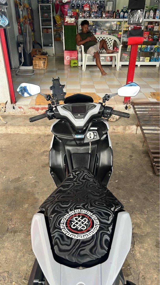 Aerox V2 2023 (Category: Motorbikes for Sale) located in Manila. Submitted by dycluterring_7 (Listing ID 1460118587, Image 1). Description: ODO: 18k Issue: may gasgas sa gilid at headlight. As seen sa pics Original michilin tire worth 12k FREE: TPO bracket at top box .