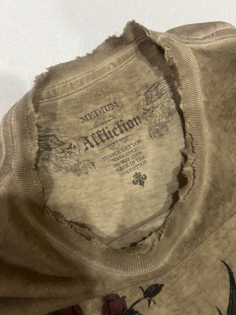 Affliction “Winged Reaper” in Brown Lava Wash (Category: Tshirts & Polo Shirts ) located in Mandaue City. Submitted by mindfreakz (Listing ID 1460168878, Image 3). Description: Personal Choice! 🌟 Affliction “Winged Reaper” in Brown Lava Wash 20”-27” Flaws: 3 pinholes (not visible ww) Condition: 9.8/10 .
