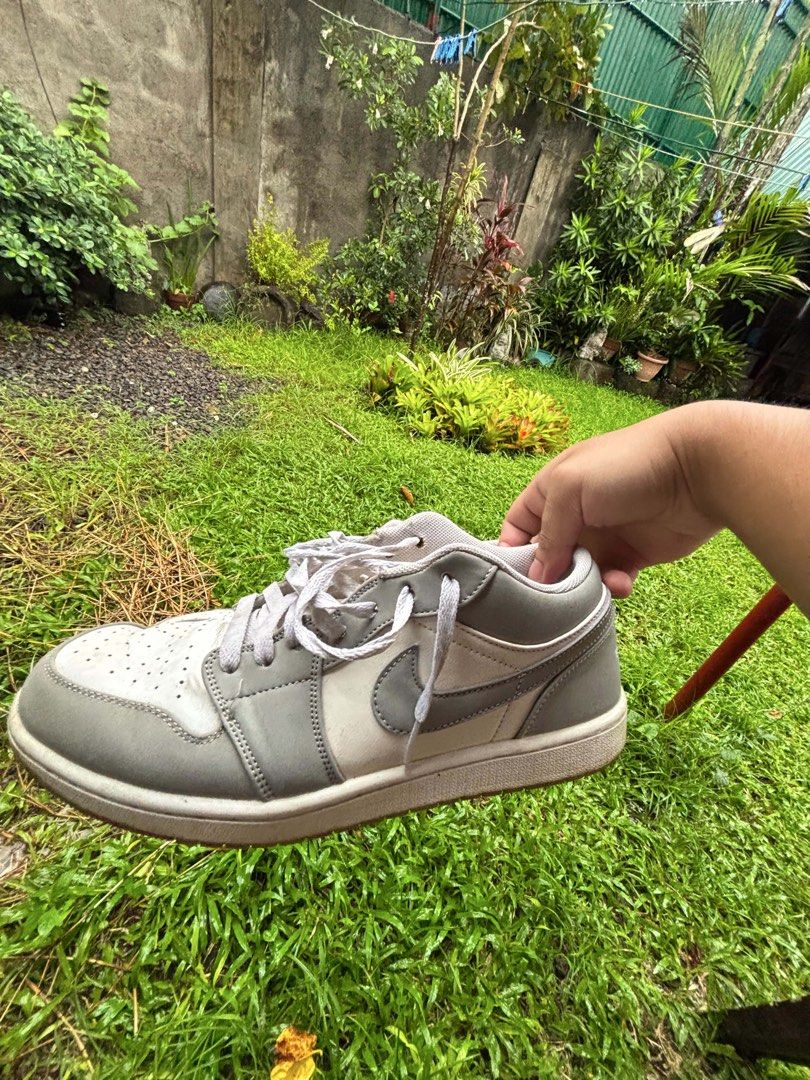 Air Jordan 1 Low “White/Wolf Grey” Sneakers (Category: Sneakers) located in Santa Cruz. Submitted by ashgennn (Listing ID 1460153560, Image 3). Description: size 9 need cleaning no issues - signs of usage only.
