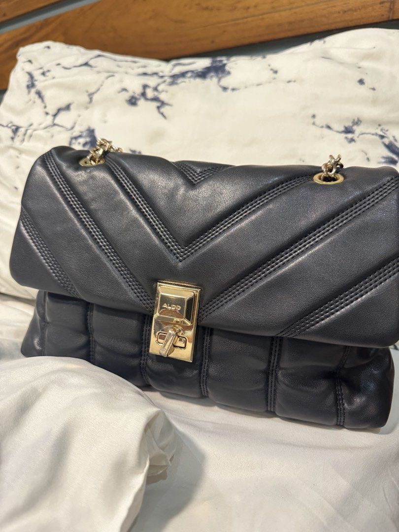 Aldo Quilted Bag (Category: Cross-body Bags) located in Legazpi City. Submitted by dgfn_413 (Listing ID 1460249888, Image 1). Description: Black Aldo Quilted bag bought in Malaysia Selling because i’m not using anymore and decluttering Pls see last photo for minor issue.