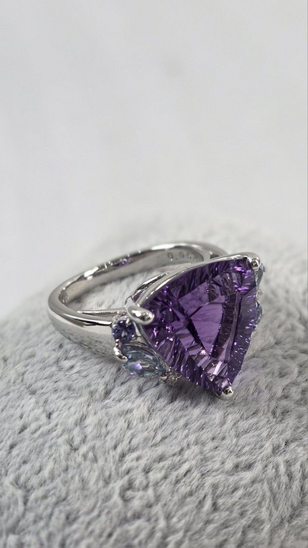Amethyst Trillion Cut K18 WG Ring (Category: Rings) located in San Fernando. Submitted by bagproject (Listing ID 1460234638, Image 2). Description: Amethyst Trillion Cut Ring K18 WG, 9.1g A7.76ct D0.05ct Size 5.5 Php 89,000.