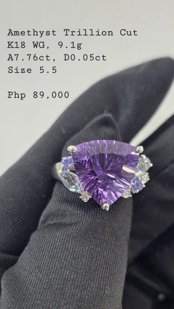 Amethyst Trillion Cut K18 WG Ring (Category: Rings) located in San Fernando. Submitted by bagproject (Listing ID 1460234638, Image 1). Description: Amethyst Trillion Cut Ring K18 WG, 9.1g A7.76ct D0.05ct Size 5.5 Php 89,000.