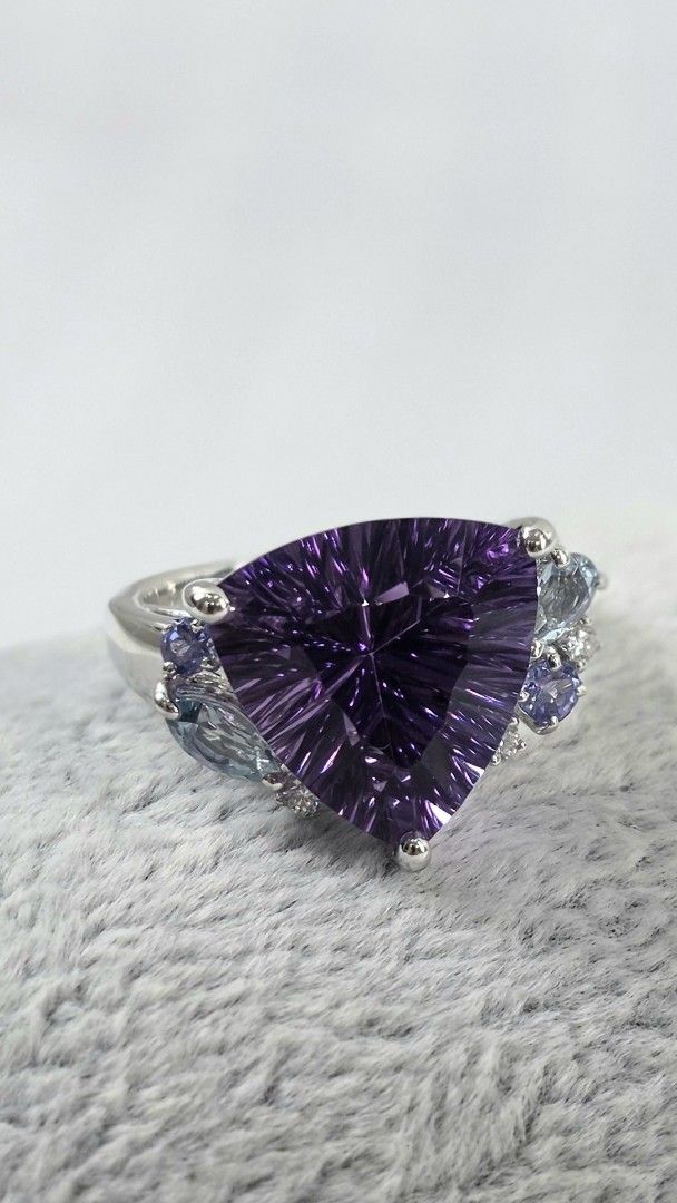 Amethyst Trillion Cut K18 WG Ring (Category: Rings) located in San Fernando. Submitted by bagproject (Listing ID 1460234638, Image 3). Description: Amethyst Trillion Cut Ring K18 WG, 9.1g A7.76ct D0.05ct Size 5.5 Php 89,000.
