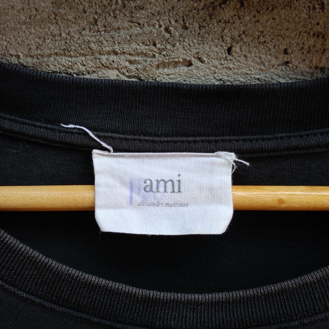 AMI BLACK TEE (Category: Tshirts & Polo Shirts ) located in Koronadal. Submitted by thriflex.29 (Listing ID 1460218838, Image 3). Description: AMI BLACK Size On Tag: Large Measurements: Width 21.5 Length 28 Condition: 9/10 - Excellent Colorate: 9/10 Issue: Sun Fade Sa Neck Part & Sleeves check photo Mine: 300.