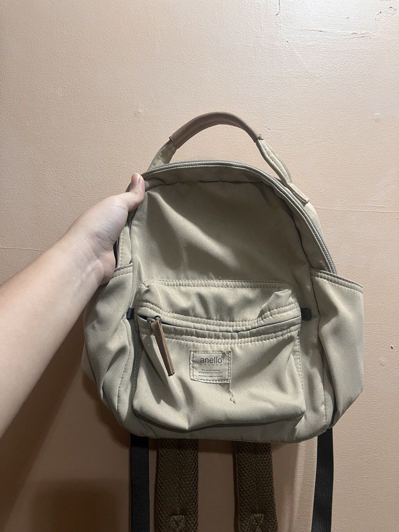 Anello Grande Motte A5 Mini Backpack Beige (Category: Backpacks) located in Manila. Submitted by _declutterbyleb (Listing ID 1460215195, Image 2). Description: - Anello Grande Motte Mini Backpack - Color: Beige - Size: A5 - Design: Rounded shape with a convenient grab handle - Features: Front zip pocket with Anello logo, multiple inner pockets - Ideal for: Everyday use - Origin: Designed in Japan.