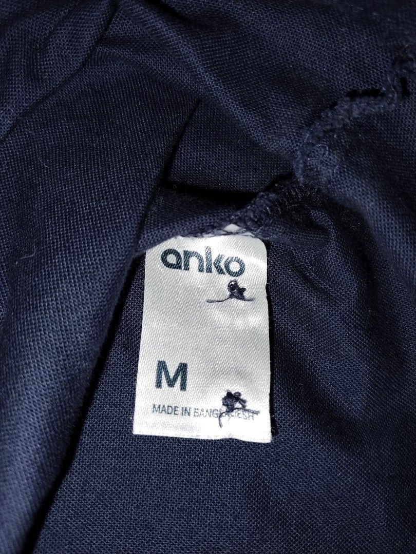 Anko Polo (Category: Tshirts & Polo Shirts ) located in Mabalacat. Submitted by al_amin_thrift (Listing ID 1460234350, Image 2). Description: L29 W 21 - Item Type: Men’s Short-Sleeve Button-Up Shirt ​ - Color: Navy Blue ​ - Size: Appears to be L/XL (for accuracy, add actual chest width and length) ​ - Fabric: Soft cotton blend, comfortable for everyday wear ​ - Features: Button-down collar, chest pocket, full button placket ​ - Condition: Very go