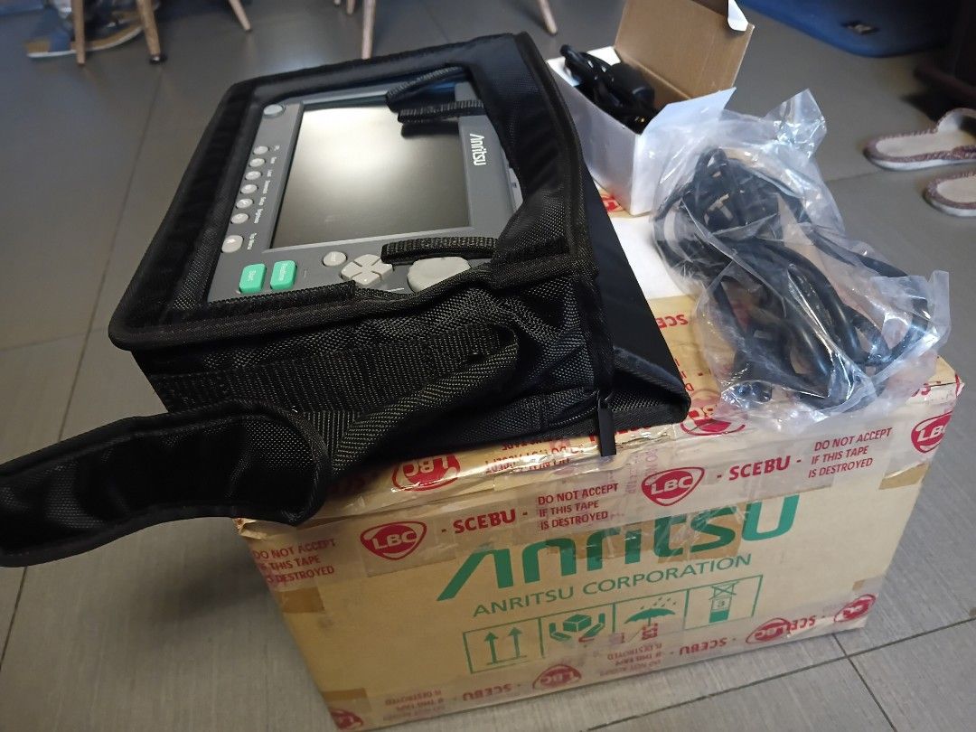 Anritsu MT9085A -OTDR (Category: Electrical, Adaptors & Sockets) located in Las Pinas. Submitted by johnquijano-0125 (Listing ID 1460113180, Image 3). Description: - Anritsu ACCESS Master MT9085A - Standard Dynamic Range unit - Includes main unit, carrying case, power adapter, battery and cables - All items in original box - Tested and working .