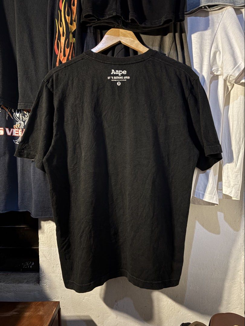 AAPE BATHING APE CAMO MOON FACE (Category: Tshirts & Polo Shirts ) located in San Jose. Submitted by jerown (Listing ID 1460223841, Image 3). Description: •L28 x W21 •EXCELLENT CONDITION •COLOR RATE 9.5/10 or better •ALL DETAILS ARE POSTED •NO ISSUE.