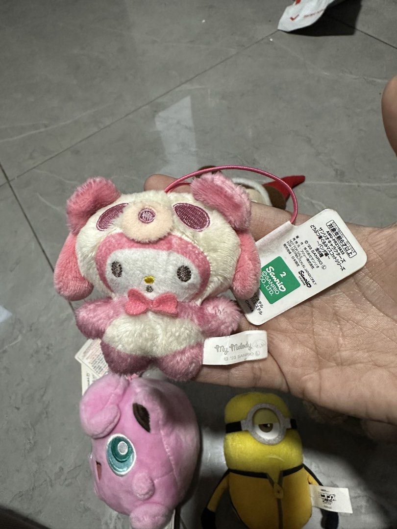 Assorted Bag charm (Category: Plushies & Soft Toys) located in Manila. Submitted by AngelResty (Listing ID 1460204282, Image 3). Description: - Bundle of 6 adorable plushies! - Includes: Mickey Mouse (Santa outfit), Minion, Sailor Moon, Jigglypuff, My Melody, and a black bear. - All plushies are brand new with tags attached. - Perfect for collectors or as a thoughtful gift. - Amazing bundle deal - get them all together!.