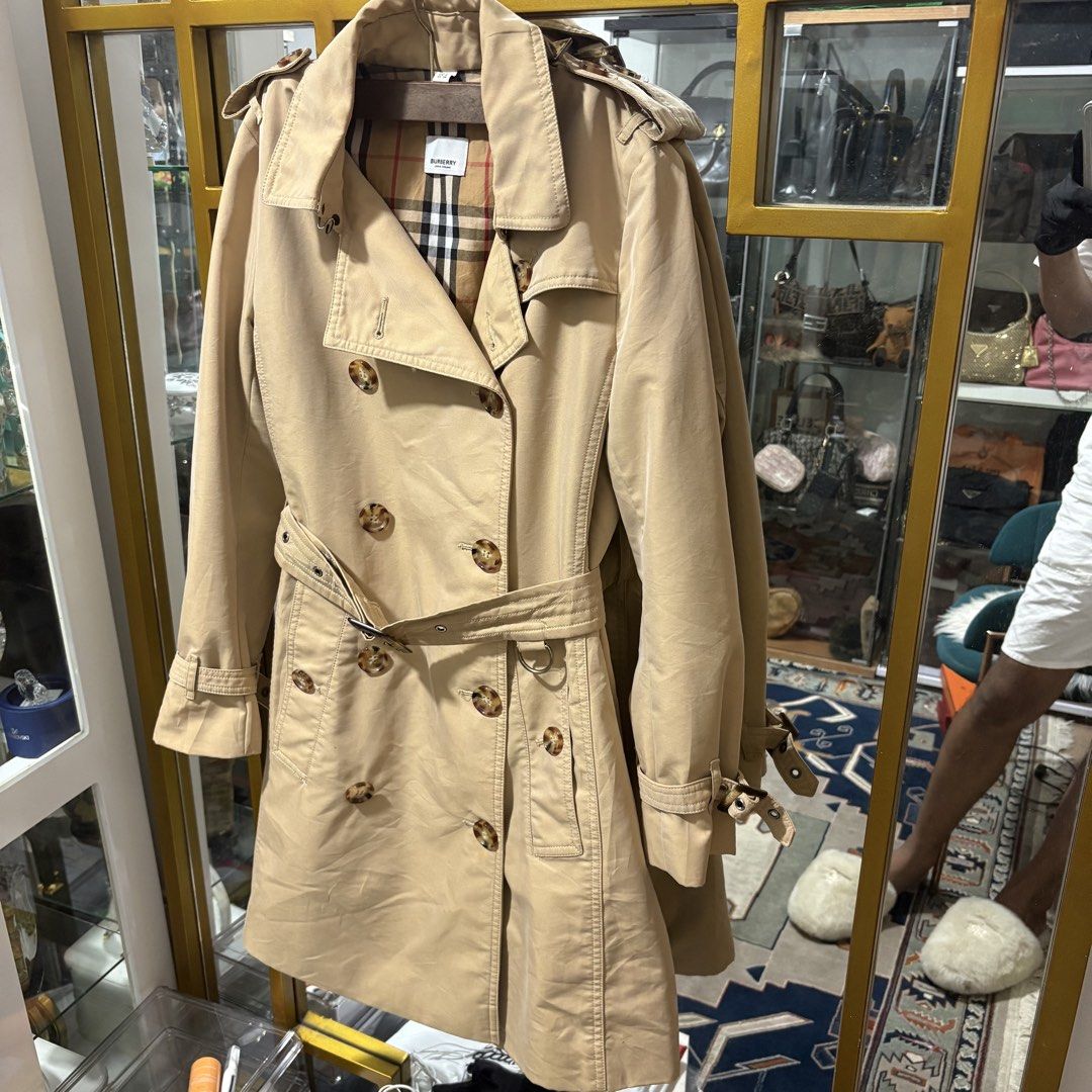 Authentic Burberry Classic Beige Trench Coat (Category: Coats, Jackets and Outerwear) located in Binangonan. Submitted by makoleksyon (Listing ID 1460234986, Image 2). Description: Excellent condition Like new No flaws length-36 Inches Width-16 inches Sleeve-22.5 Inches Shoulder -16 Inches With garment bag included Bought in Japan 💯% Authentic Money back guarantee.