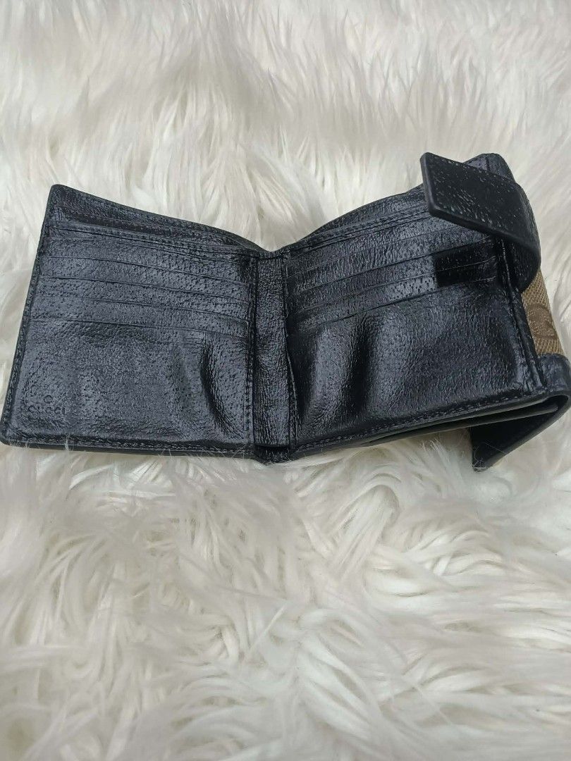 AUTHENTIC GUCCI CHARMY UNISEX TRIFOLD WALLET (Category: Luxury Bags & Wallets) located in Bayombong. Submitted by Gentlemans_ClosEt (Listing ID 1460171487, Image 3). Description: AUTHENTIC GUCCI CHARMY UNISEX TRIFOLD WALLET 💯% GUARANTEED AUTHENTIC/LEGIT JAPAN SURPLUS SOURCE NO LEATHER CRACKS NO RUBS ON THE CANVAS MINIMAL SIGN OF USAGE INSIDE THE WALLET RECOLOR LEATHER FOR PRESENTABLE LOOKS.