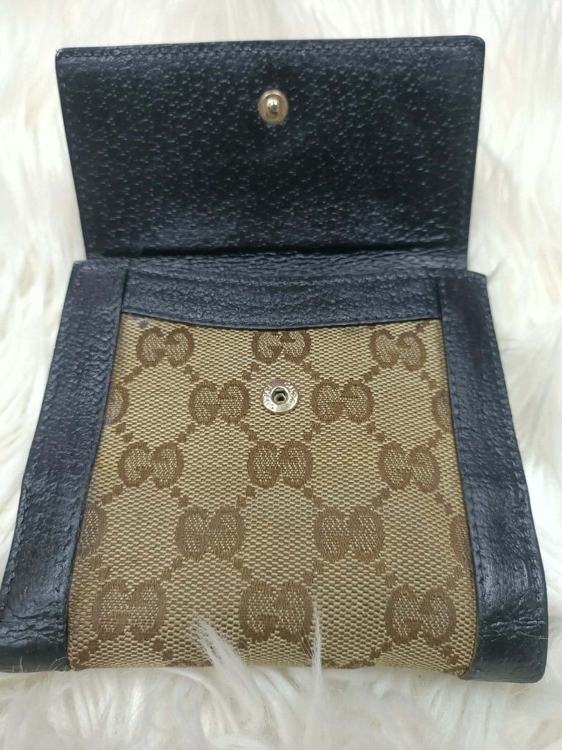 AUTHENTIC GUCCI CHARMY UNISEX TRIFOLD WALLET (Category: Luxury Bags & Wallets) located in Bayombong. Submitted by Gentlemans_ClosEt (Listing ID 1460171487, Image 2). Description: AUTHENTIC GUCCI CHARMY UNISEX TRIFOLD WALLET 💯% GUARANTEED AUTHENTIC/LEGIT JAPAN SURPLUS SOURCE NO LEATHER CRACKS NO RUBS ON THE CANVAS MINIMAL SIGN OF USAGE INSIDE THE WALLET RECOLOR LEATHER FOR PRESENTABLE LOOKS.