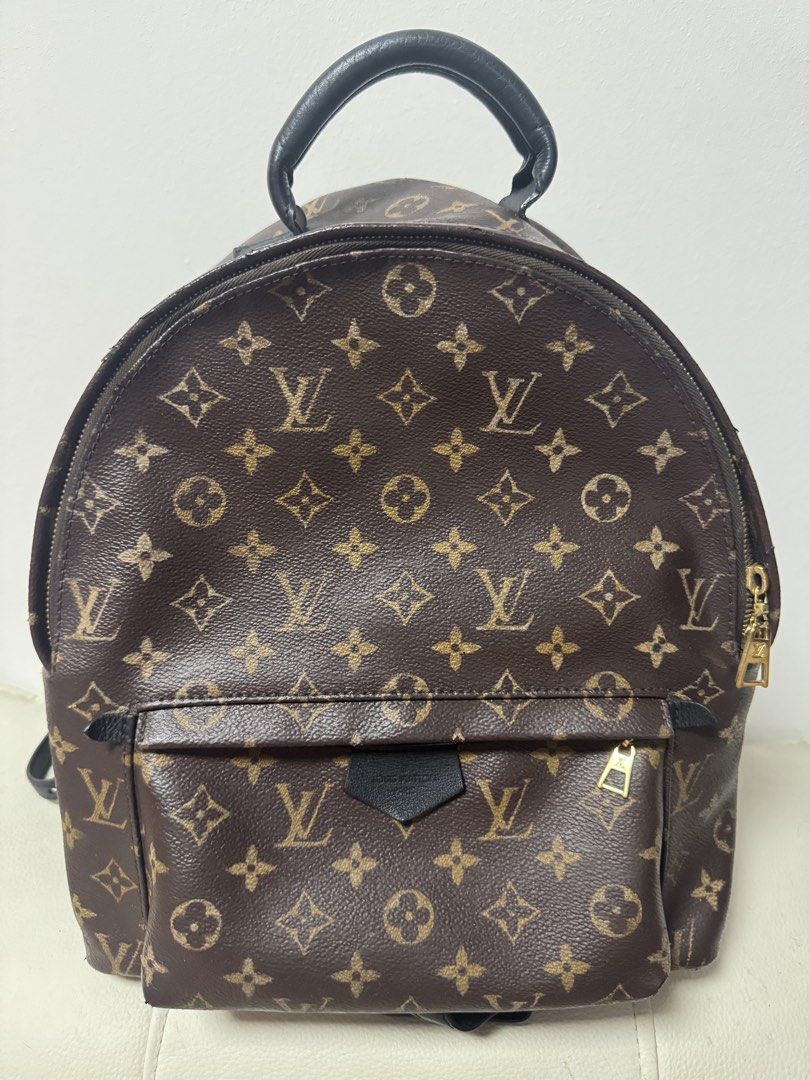 Authentic LV backpack (Category: Bags & Wallets) located in Singapore. Submitted by so.goodbuy (Listing ID 1460189372, Image 2). Description: Authentic LV backpack MM size Very light weight 28x33x16cm Unisex Can use for traveling& daily work & gym .