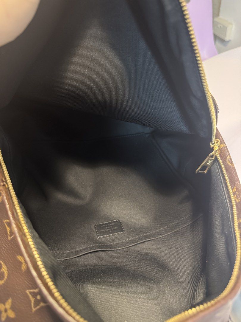 Authentic LV backpack (Category: Bags & Wallets) located in Singapore. Submitted by so.goodbuy (Listing ID 1460189372, Image 3). Description: Authentic LV backpack MM size Very light weight 28x33x16cm Unisex Can use for traveling& daily work & gym .