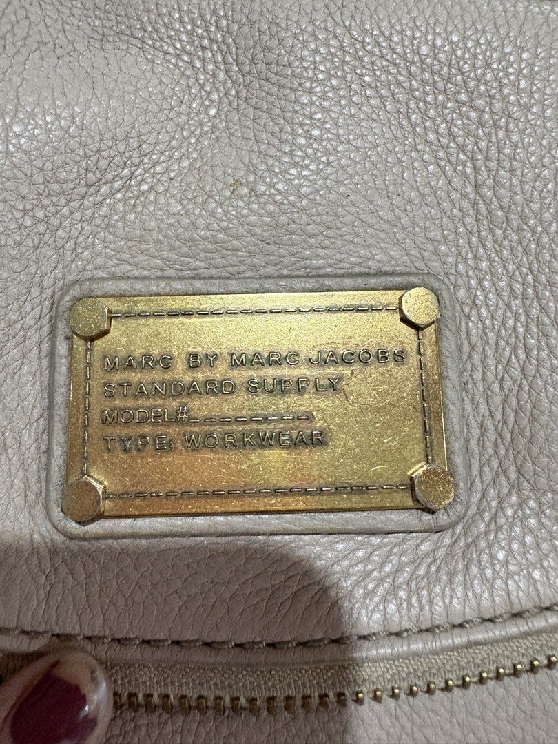 Authentic Marc by Marc Jacobs (Category: Cross-body Bags) located in Antipolo. Submitted by cherrylblossom (Listing ID 1460227822, Image 2). Description: Authentic Good Condition Durable Leather shows Sign of usage stains need cleaning But very nice siya talaga promise No Flaws only sign of usage Mura na sa quality ng leather superb Free shipping na .