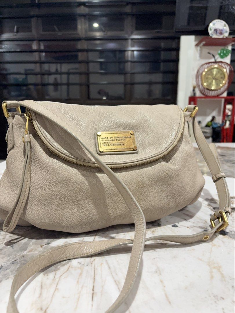 Authentic Marc by Marc Jacobs (Category: Cross-body Bags) located in Antipolo. Submitted by cherrylblossom (Listing ID 1460227822, Image 1). Description: Authentic Good Condition Durable Leather shows Sign of usage stains need cleaning But very nice siya talaga promise No Flaws only sign of usage Mura na sa quality ng leather superb Free shipping na .