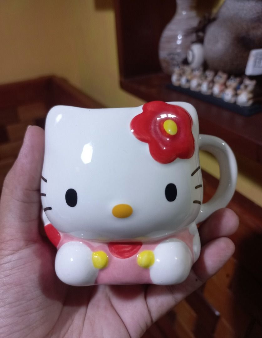 AUTHENTIC Sanrio Hello Kitty 3D face Ceramic Mug (2014 Edition) (Category: Coffee & Tea Tableware) located in Pugo. Submitted by mhylee_fang1989 (Listing ID 1460220423, Image 1). Description: .