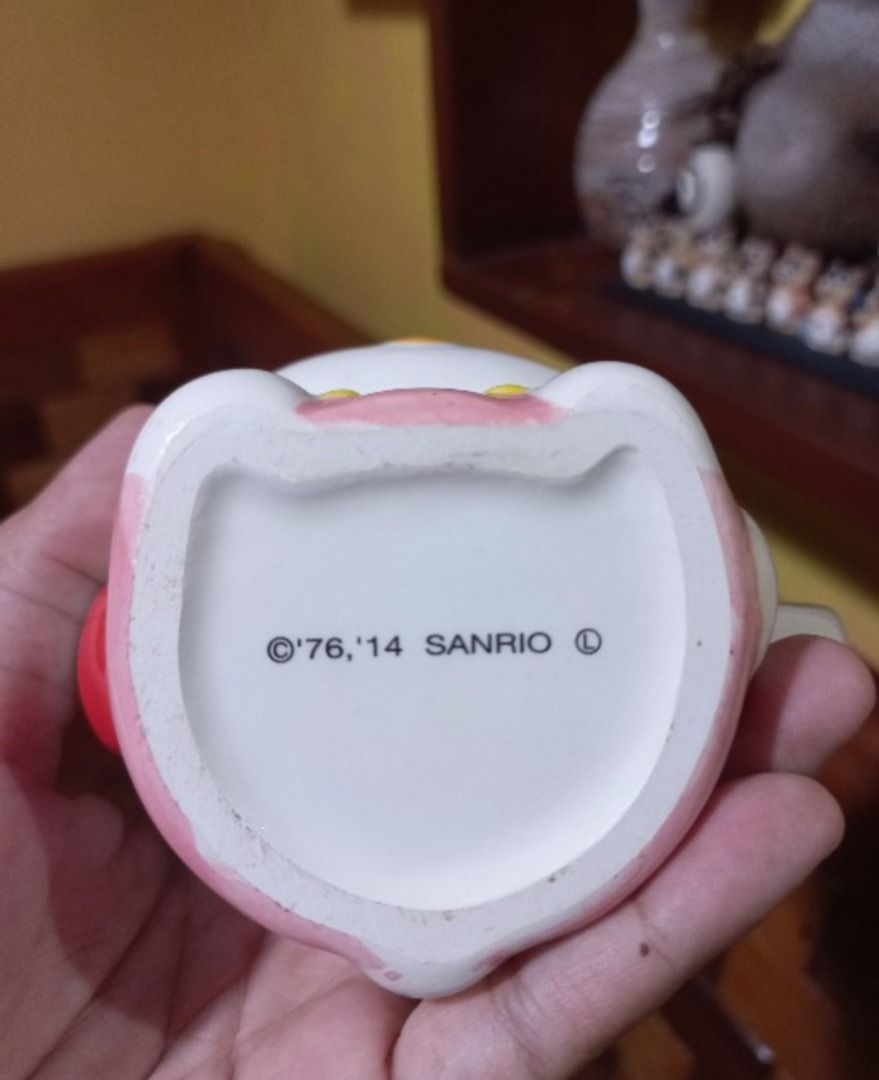 AUTHENTIC Sanrio Hello Kitty 3D face Ceramic Mug (2014 Edition) (Category: Coffee & Tea Tableware) located in Pugo. Submitted by mhylee_fang1989 (Listing ID 1460220423, Image 3). Description: .