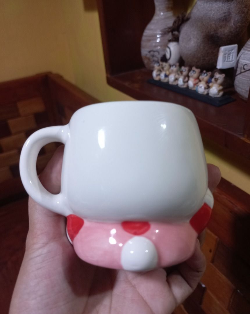AUTHENTIC Sanrio Hello Kitty 3D face Ceramic Mug (2014 Edition) (Category: Coffee & Tea Tableware) located in Pugo. Submitted by mhylee_fang1989 (Listing ID 1460220423, Image 2). Description: .