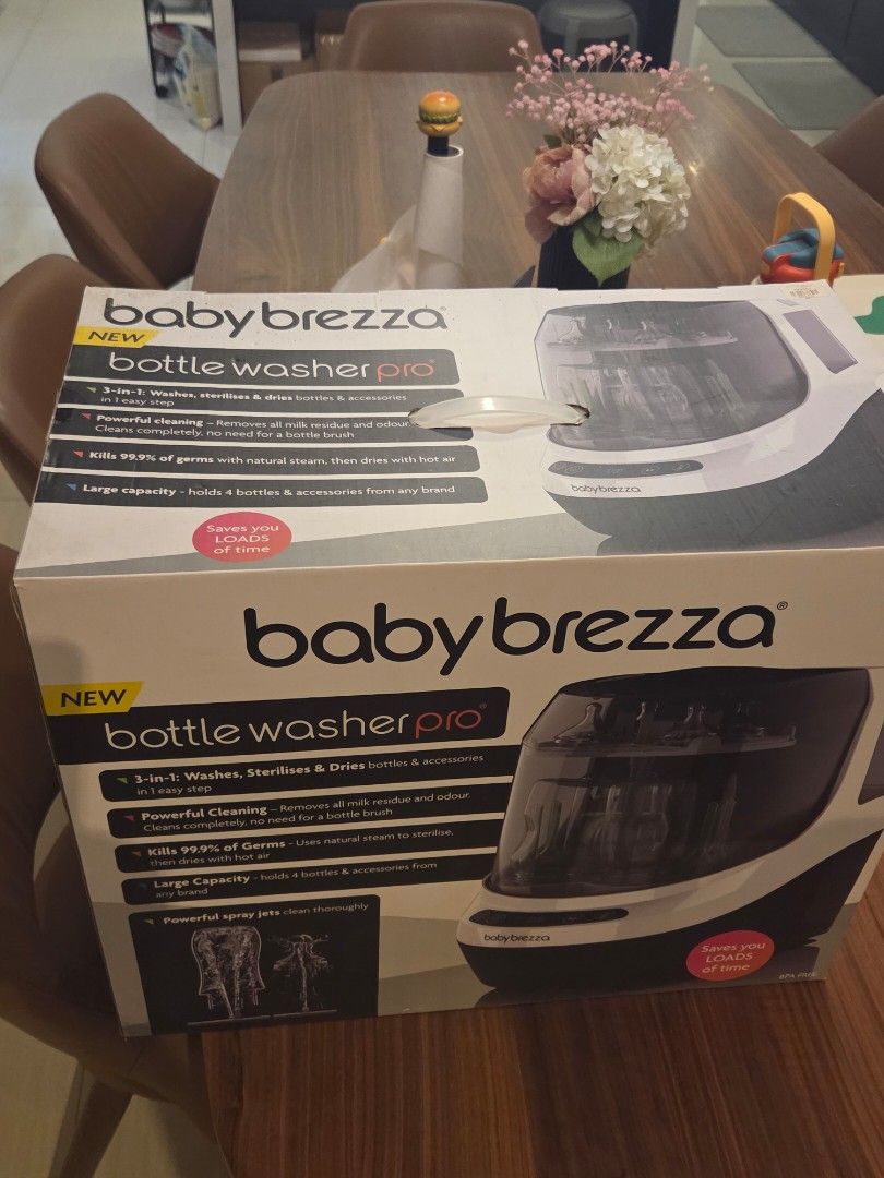 Baby Brezza Bottle Washer Pro Sterilizer Dryer (Category: Breastfeeding & Bottle Feeding) located in Makati City. Submitted by zzmm9090yyzz (Listing ID 1460220310, Image 2). Description: - Kills 99.9% of germs using natural steam. - Washes, sterilizes, and dries bottles and accessories in one easy step. - Powerful cleaning removes milk residue and odour. - Large capacity holds 4 bottles and accessories. - Saves you loads of time..
