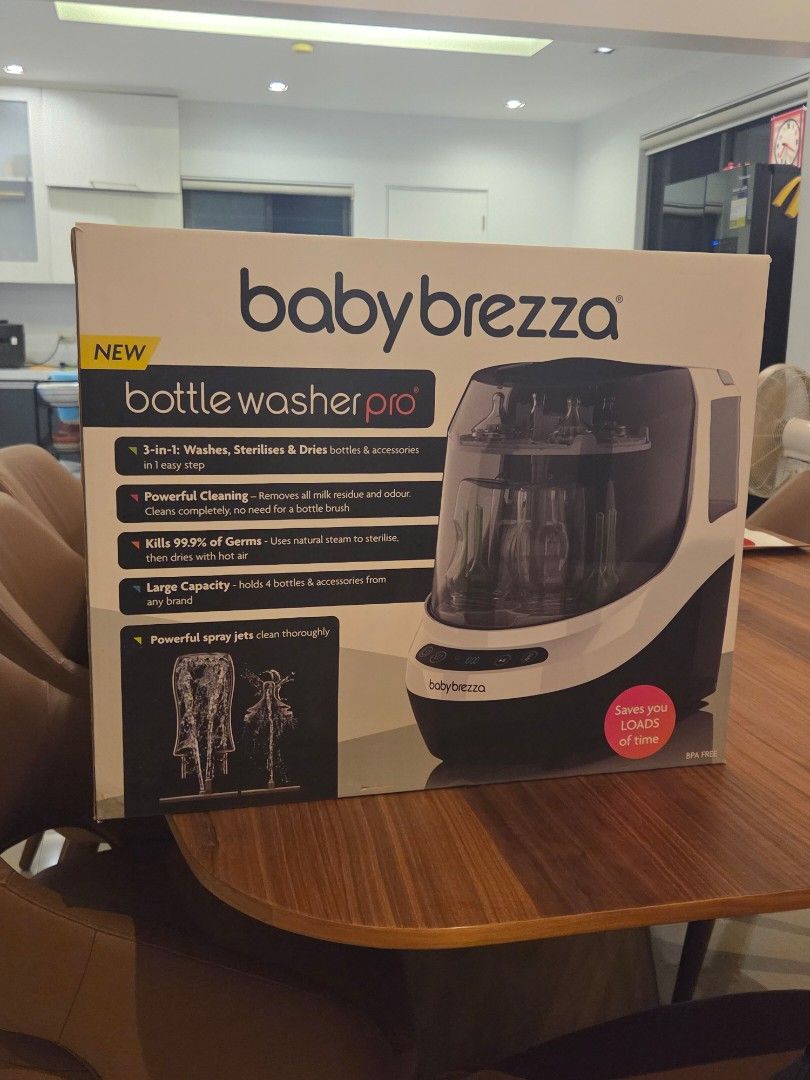 Baby Brezza Bottle Washer Pro Sterilizer Dryer (Category: Breastfeeding & Bottle Feeding) located in Makati City. Submitted by zzmm9090yyzz (Listing ID 1460220310, Image 1). Description: - Kills 99.9% of germs using natural steam. - Washes, sterilizes, and dries bottles and accessories in one easy step. - Powerful cleaning removes milk residue and odour. - Large capacity holds 4 bottles and accessories. - Saves you loads of time..