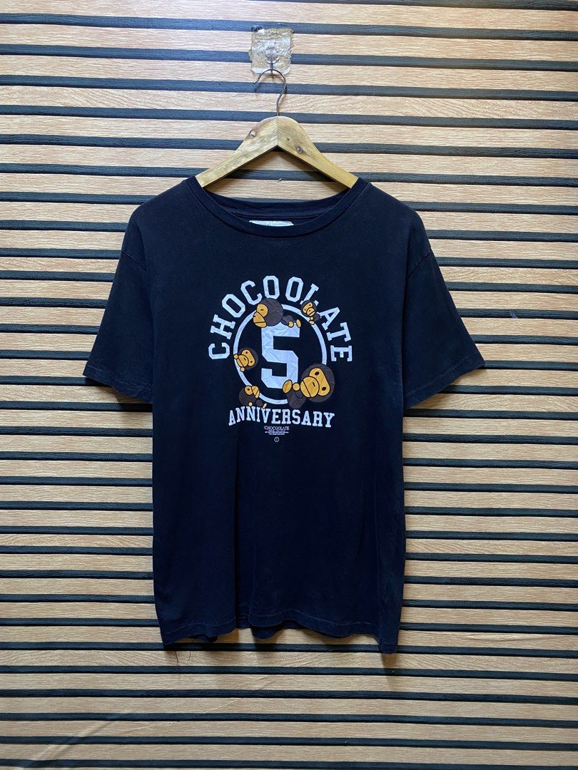 Baby milo by A Bathing ape x Chocolate (Category: Tshirts & Polo Shirts ) located in Makati City. Submitted by drip.poww (Listing ID 1460275787, Image 1). Description: - Authentic Bape x Chocolate - Color: Black - Size: Large - Dimes: 22x28 - Authentic - Excellent condition - Need wash, fresh from bale - Material: 100% Cotton Please don’t expect too much—these are thrifted (ukay) items. 😊 !!STILL NEGOTIABLE!!.