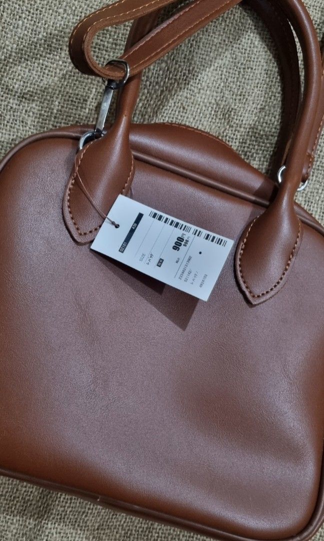 Bag (Category: Cross-body Bags) located in San Jose del Monte. Submitted by angelsnest (Listing ID 1460199250, Image 3). Description: Padala from Japan with tag Has oxidized silver hardwares (pls see last pic) Intact rubber lining with free brown belt rfs: decluttering Gcash, Maya, or Bank transfer.