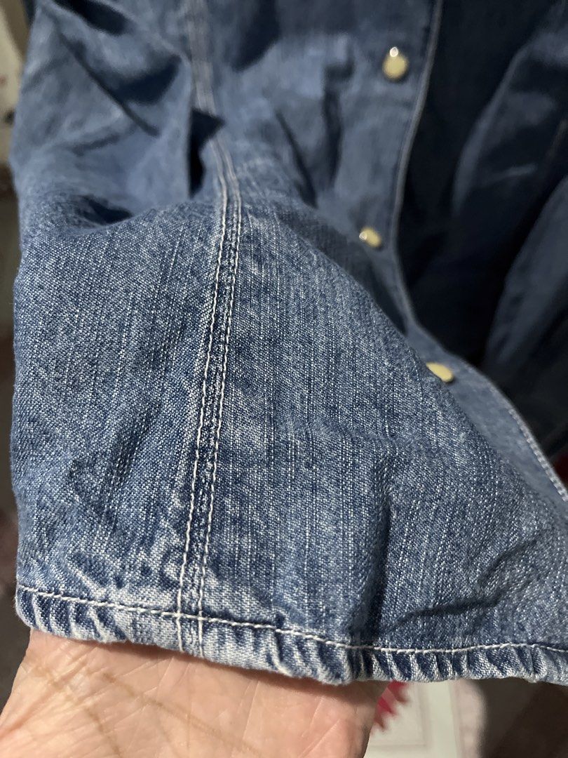 Banana Republic Denim Jacket/Shirt (Category: Coats, Jackets and Outerwear) located in Botolan. Submitted by arrietafrancinealexis (Listing ID 1460131933, Image 3). Description: - Classic blue denim shirt - Brand: Banana Republic - Style: Button-up, long sleeves, collared - Fit: Tailored seams for a flattering look - Versatility: Ideal for casual and smart-casual outfits - Wardrobe essential .