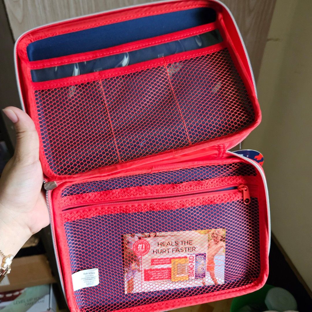 Band-Aid First Aid Kit bag with a geometric plus-sign pattern (Category: Medical Supplies & Tools) located in Digos. Submitted by marianfinds (Listing ID 1460173567, Image 2). Description: Authentic/preloved item. Actual photos posted. Please check all photos and details carefully before purchasing. Minor signs of use may be present. 📌Please manage your expectations this is not brandnew Walk in buyers are always welcome!✨️ 📍Location: Lim extens