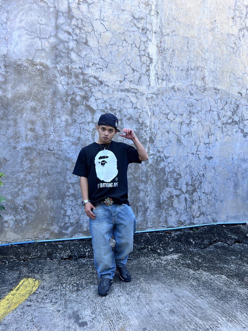 BAPE APE HEAD TEE BLACK (Auth) (Category: Tshirts & Polo Shirts ) located in Cavite. Submitted by zacharyyy__ (Listing ID 1460149454, Image 2). Description: - Classic black BAPE t-shirt - Features iconic ape head graphic - Graphic has a cool iridescent effect - Dimes 22 x 28 Large on tag - Has light crack prints on logo 1,200 nego for sure buyer 📍gma cavite .