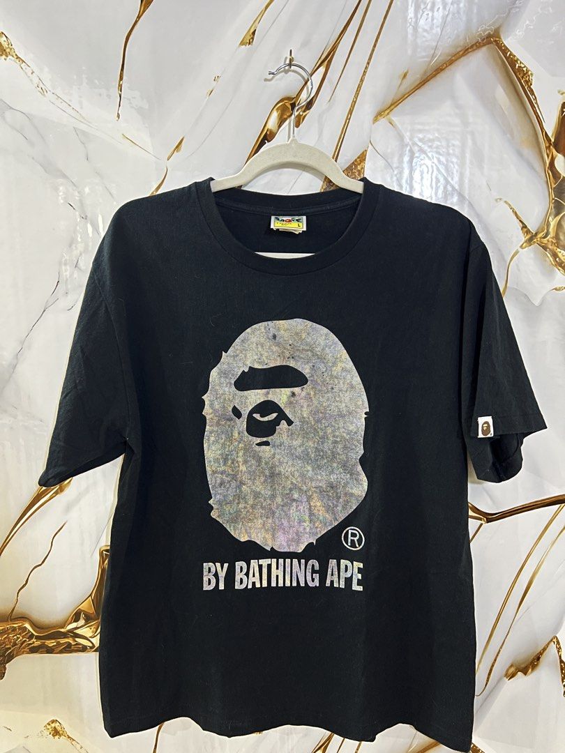 BAPE APE HEAD TEE BLACK (Auth) (Category: Tshirts & Polo Shirts ) located in Cavite. Submitted by zacharyyy__ (Listing ID 1460149454, Image 1). Description: - Classic black BAPE t-shirt - Features iconic ape head graphic - Graphic has a cool iridescent effect - Dimes 22 x 28 Large on tag - Has light crack prints on logo 1,200 nego for sure buyer 📍gma cavite .